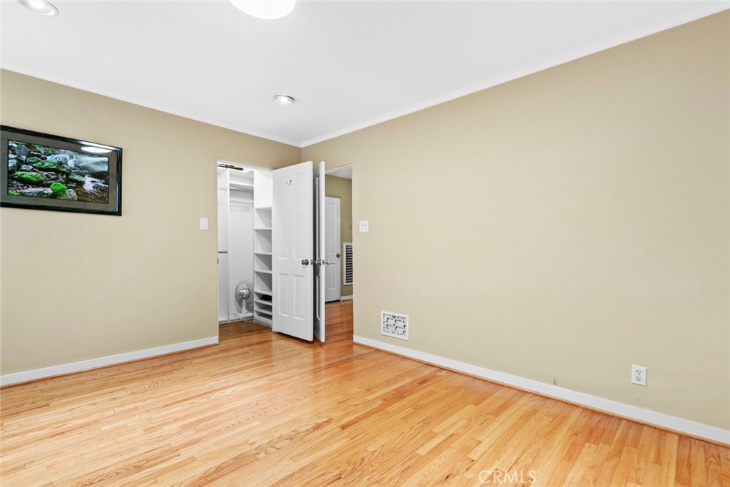 545 Spencer Street Glendale, CA 91202 - Photo 12 of 21 a view of empty room with wooden floor