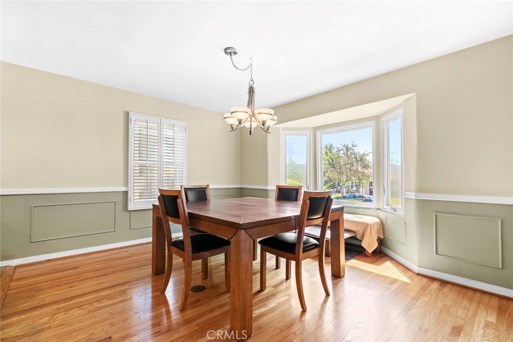 545 Spencer Street Glendale, CA 91202 - Photo 6 of 21 a view of a dining room with furniture window and wooden floor