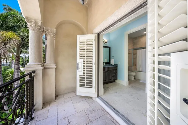 a spacious bedroom with a bed and a window