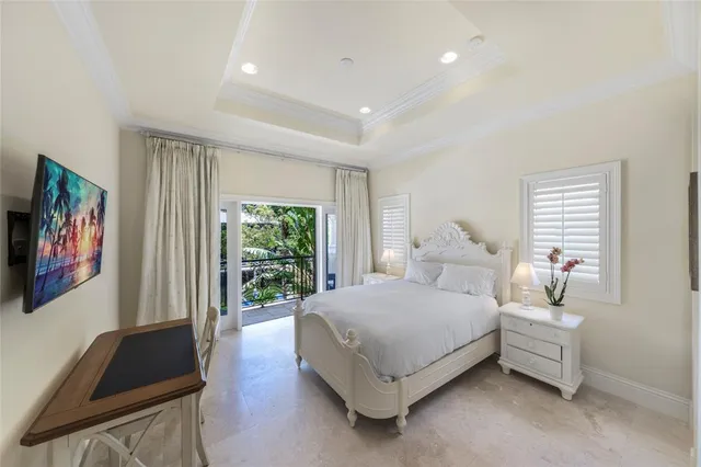 a bathroom with a granite countertop sink a mirror a toilet and shower