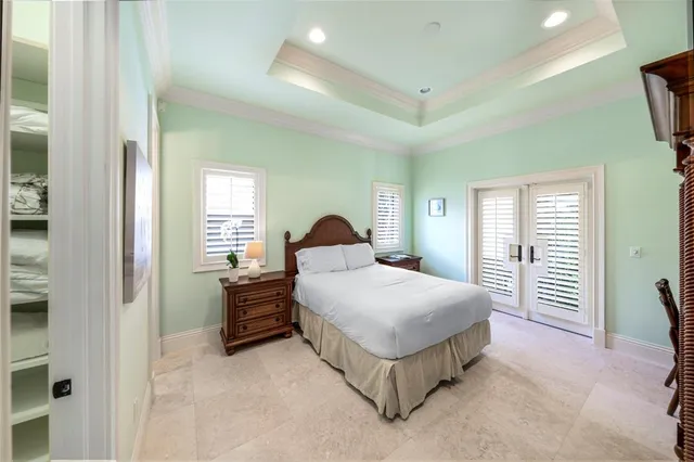 a bathroom with a granite countertop sink toilet a mirror and shower