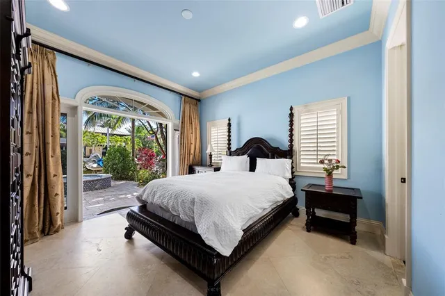a view of swimming pool with outdoor seating and a potted plants