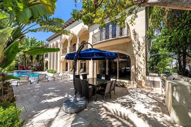 a view of a swimming pool with a deck