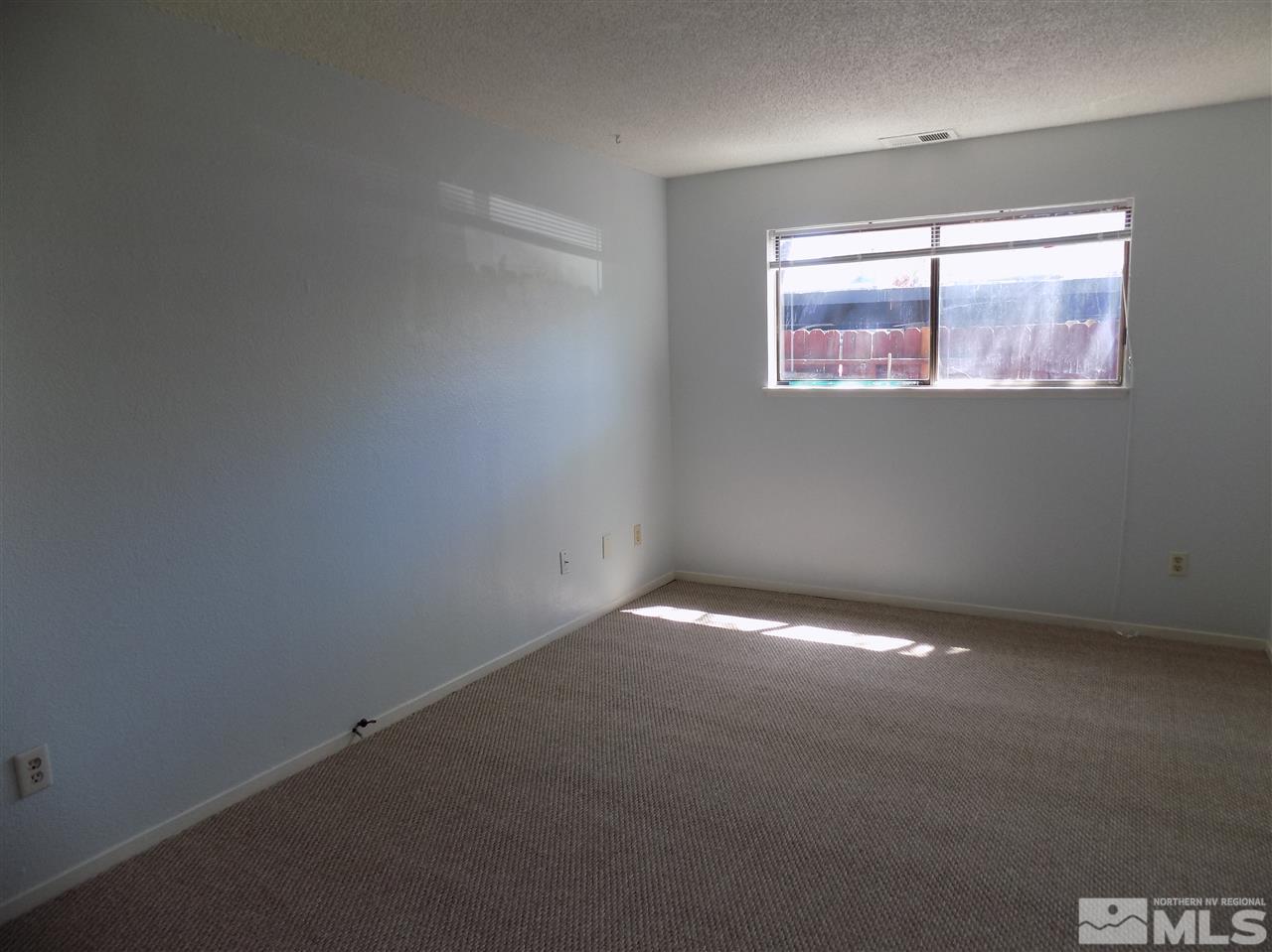 2189 Kietzke Lane Reno, NV 89502 - Photo 11 of 20 an empty room with a window