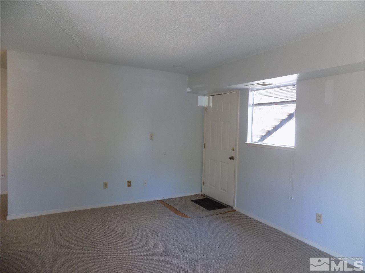 2189 Kietzke Lane Reno, NV 89502 - Photo 14 of 20 a view of an empty room and a window