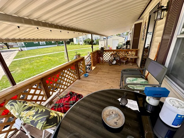 a view of swimming pool with furniture
