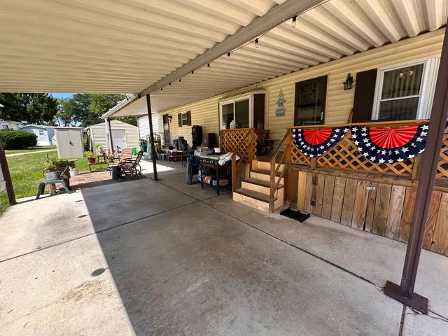 a view of living room and patio