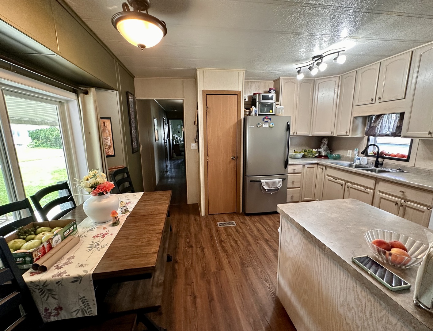 1336 Douglas Avenue, Unit 13 Montgomery, IL 60538 - Photo 8 of 23 a kitchen with stainless steel appliances granite countertop a refrigerator and a stove top oven