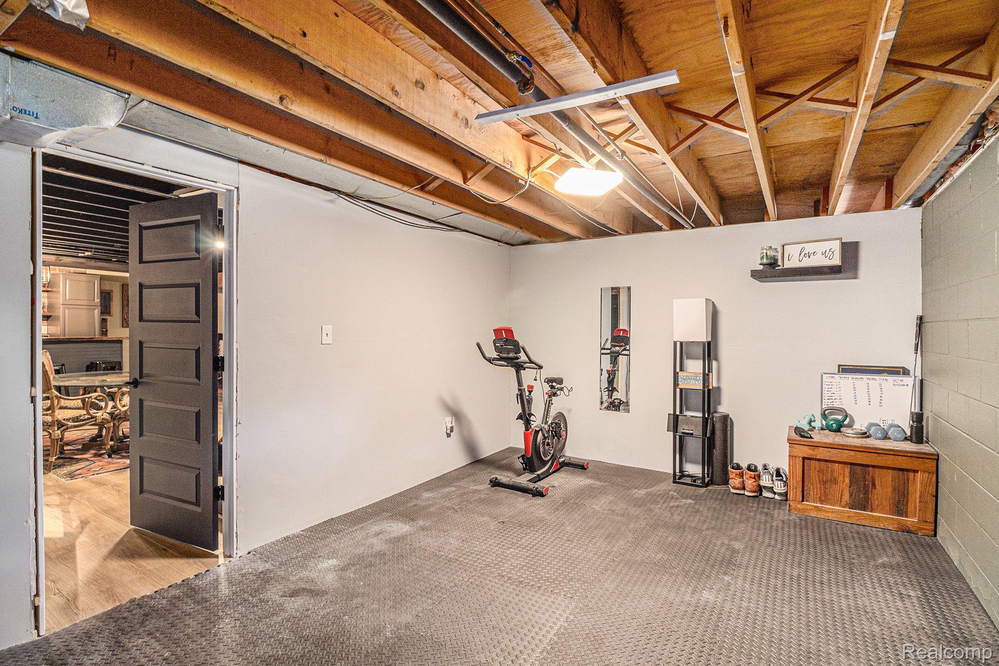 3983 Mason Road Howell, MI 48843 - Photo 20 of 28 Room to left of steps has a workout space