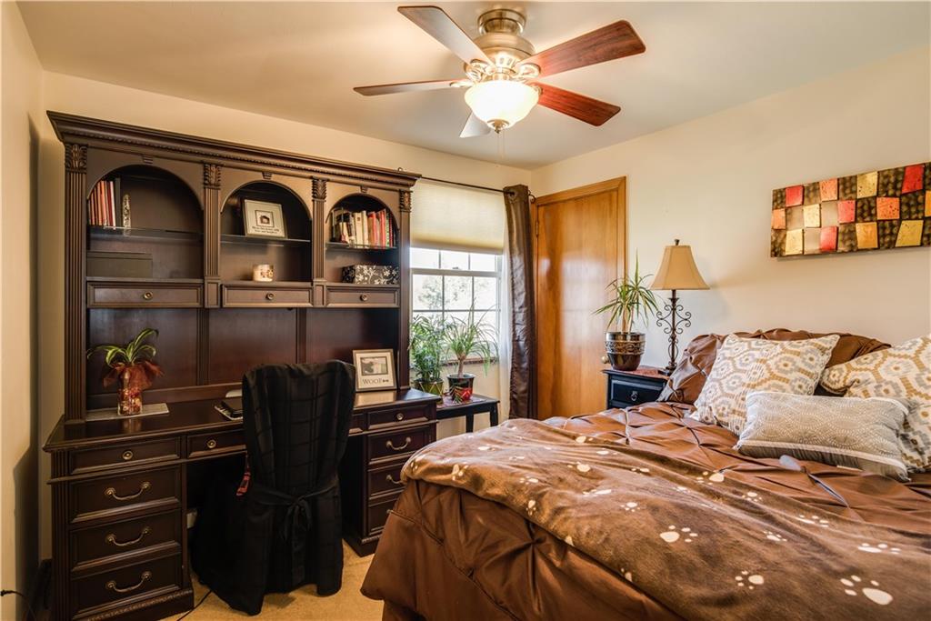 842 Rosalind Road Pittsburgh, PA 15237 - Photo 11 of 21 THE SECOND BEDROOM IS 10'X10' AND ALSO FEATURES A CEILING FAN.