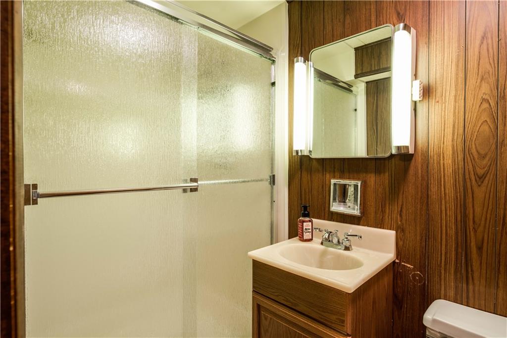 842 Rosalind Road Pittsburgh, PA 15237 - Photo 15 of 21 A SECOND FULL BATH WITH A NEW WALK IN SHOWER IS LOCATED DOWN IN THE GAME ROOM.
