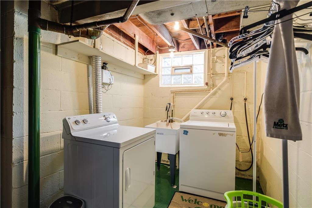 842 Rosalind Road Pittsburgh, PA 15237 - Photo 16 of 21 LAUNDRY ROOM MEASURES 9'X9' AND THE WASHER AND DRYER STAY WITH THE HOME!