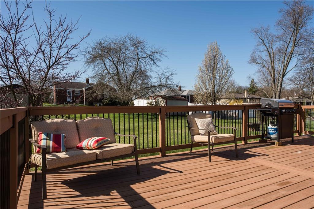 842 Rosalind Road Pittsburgh, PA 15237 - Photo 19 of 21 THE NEW DECK IS OVERSIZED AND CAN CERTAINLY ACCOMODATE YOUR FRIENDS AND FAMILY.
