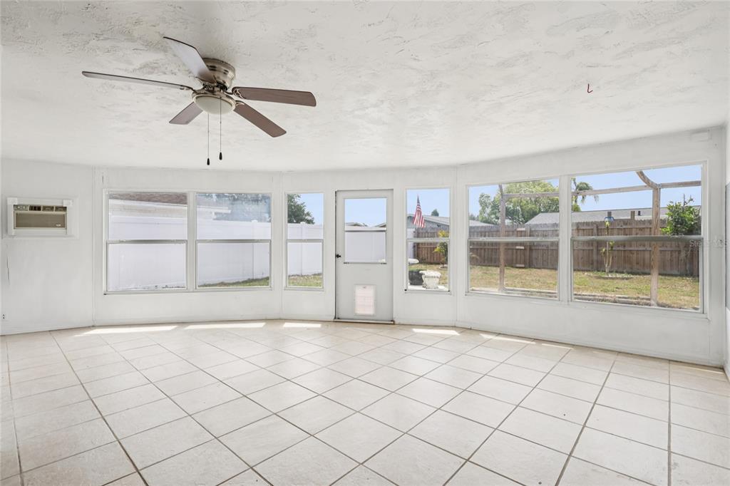 3548 Darlington Road Holiday, FL 34691 - Photo 23 of 32 a view of a livingroom with an empty space and a window