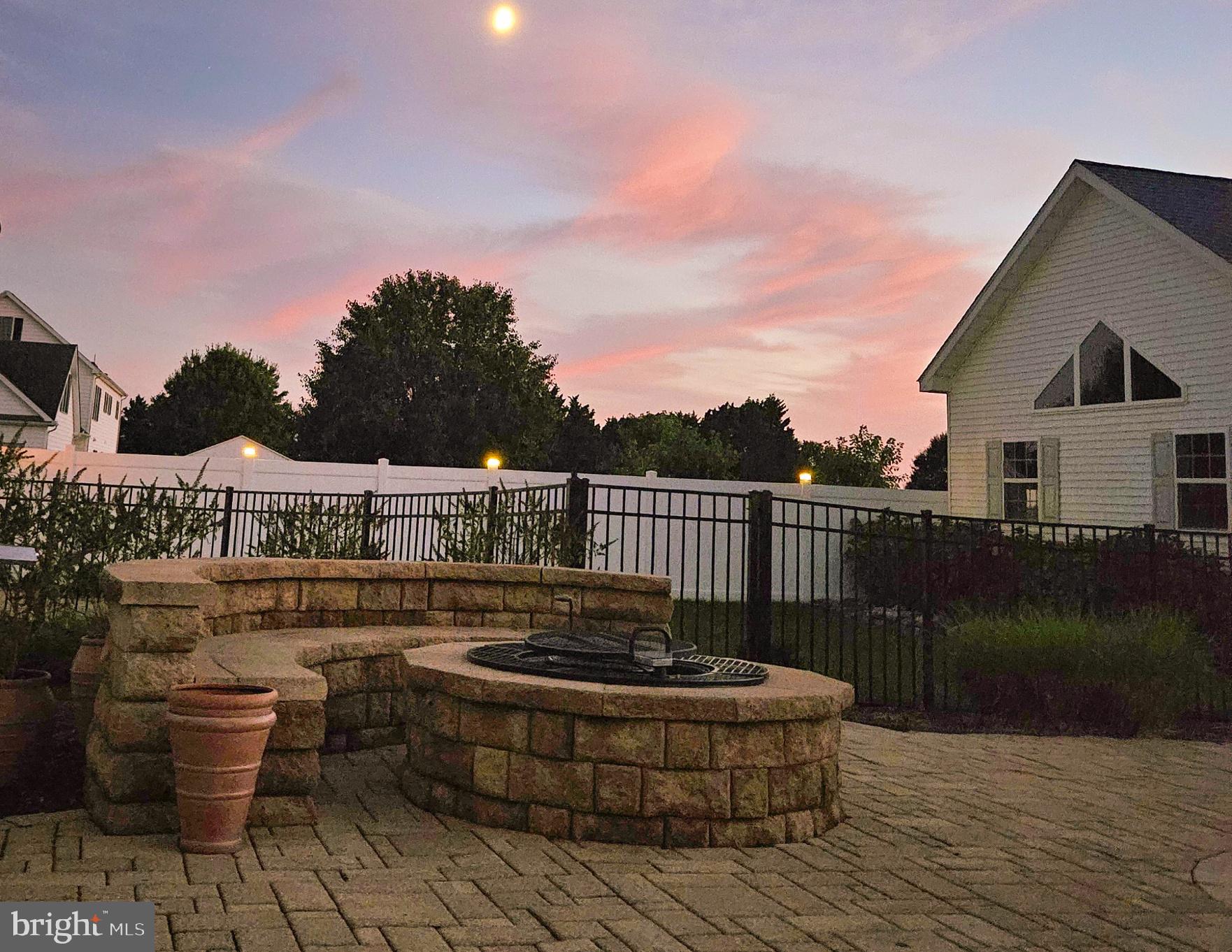 6660 Reeses Pride Road Sherwood, MD 21665 - Photo 25 of 72 a view of a house with backyard and garden