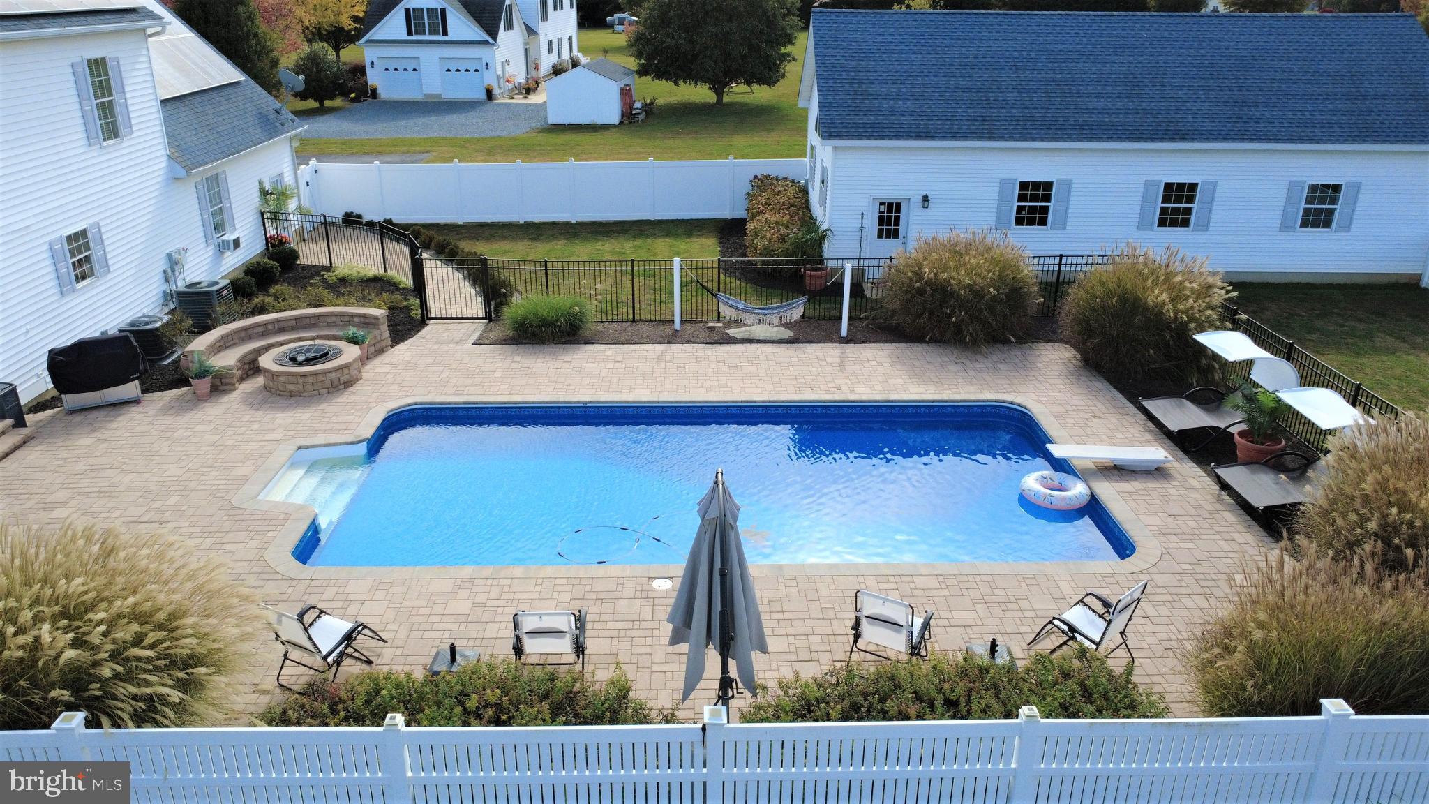 6660 Reeses Pride Road Sherwood, MD 21665 - Photo 3 of 72 a view of a chairs and table in the patio