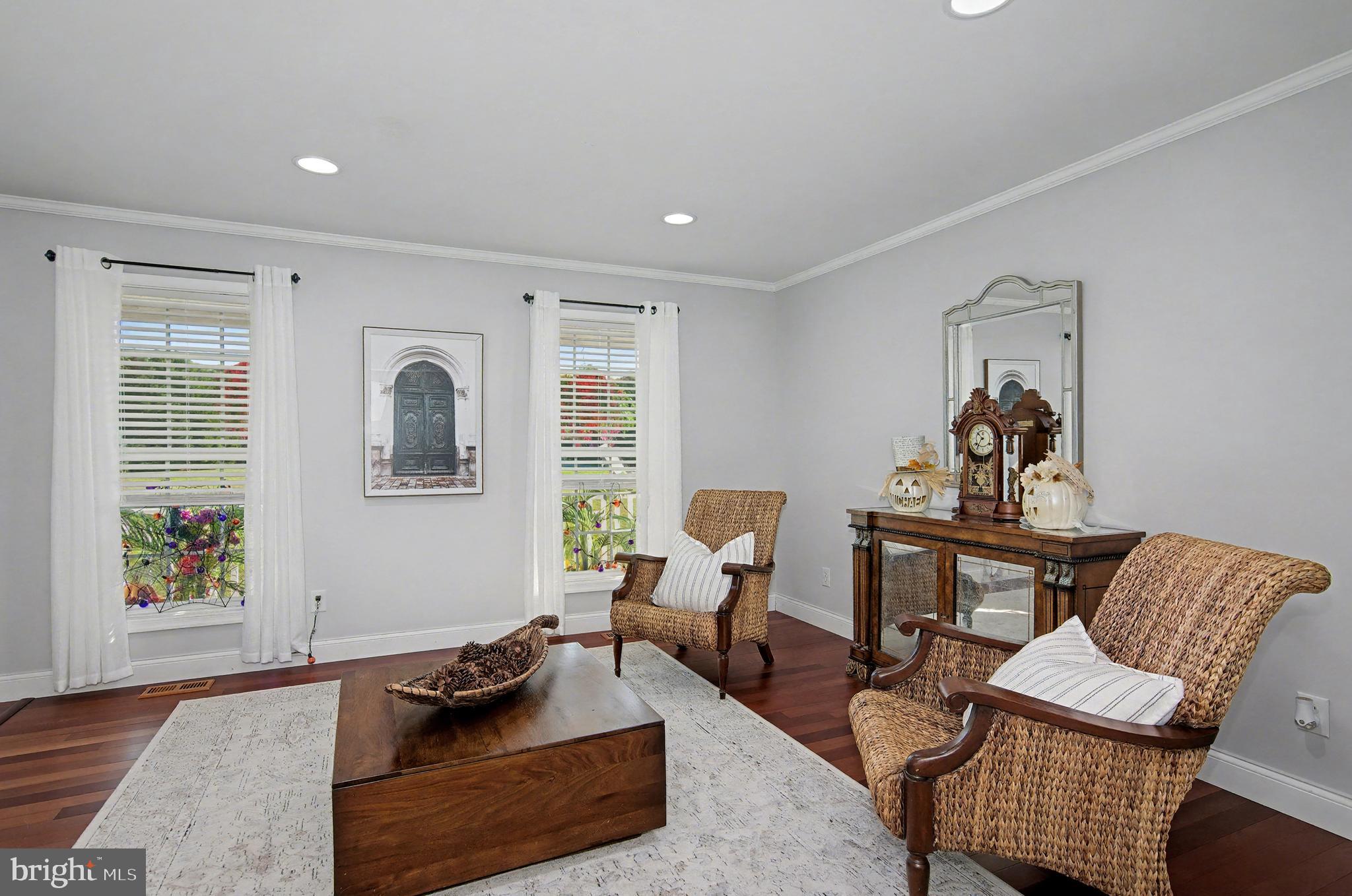 6660 Reeses Pride Road Sherwood, MD 21665 - Photo 33 of 72 a living room with furniture and wooden floor