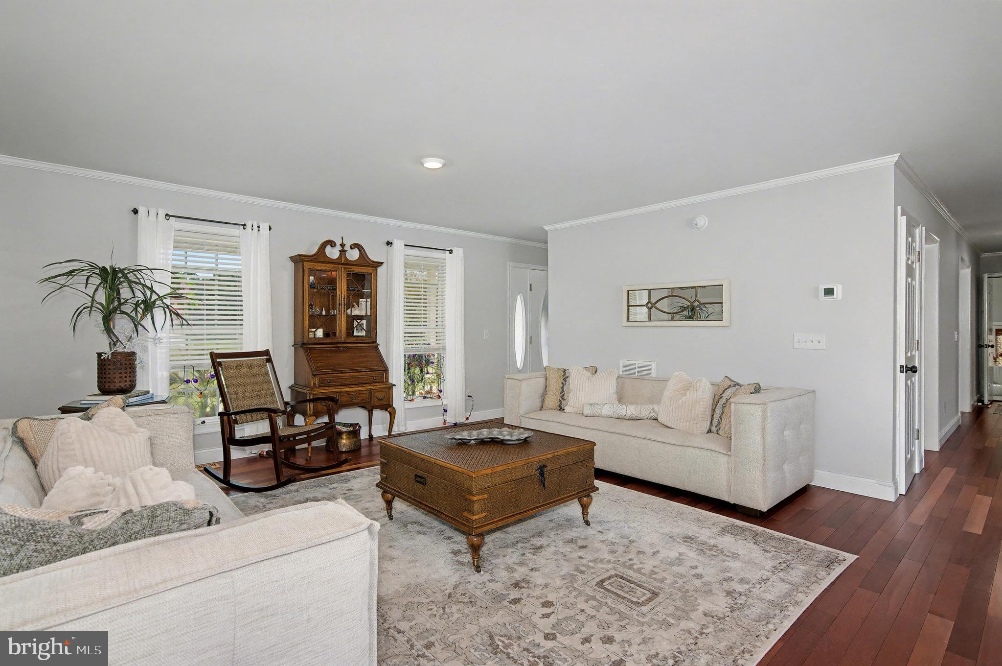 6660 Reeses Pride Road Sherwood, MD 21665 - Photo 41 of 72 a living room with furniture and wooden floor