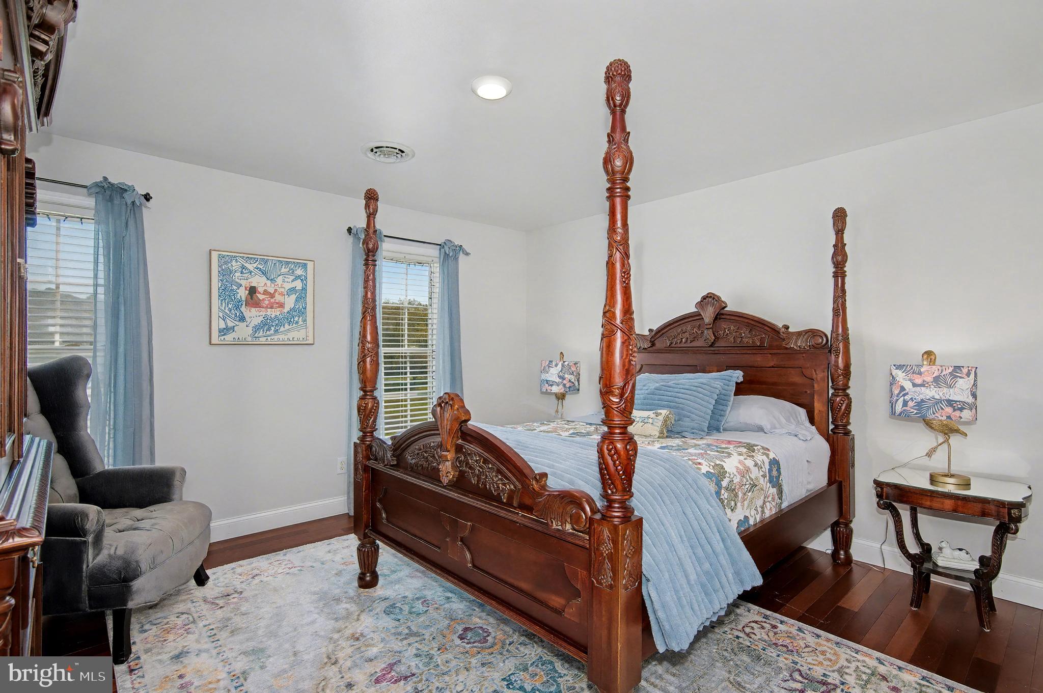 6660 Reeses Pride Road Sherwood, MD 21665 - Photo 49 of 72 a bedroom with furniture and a wooden floor