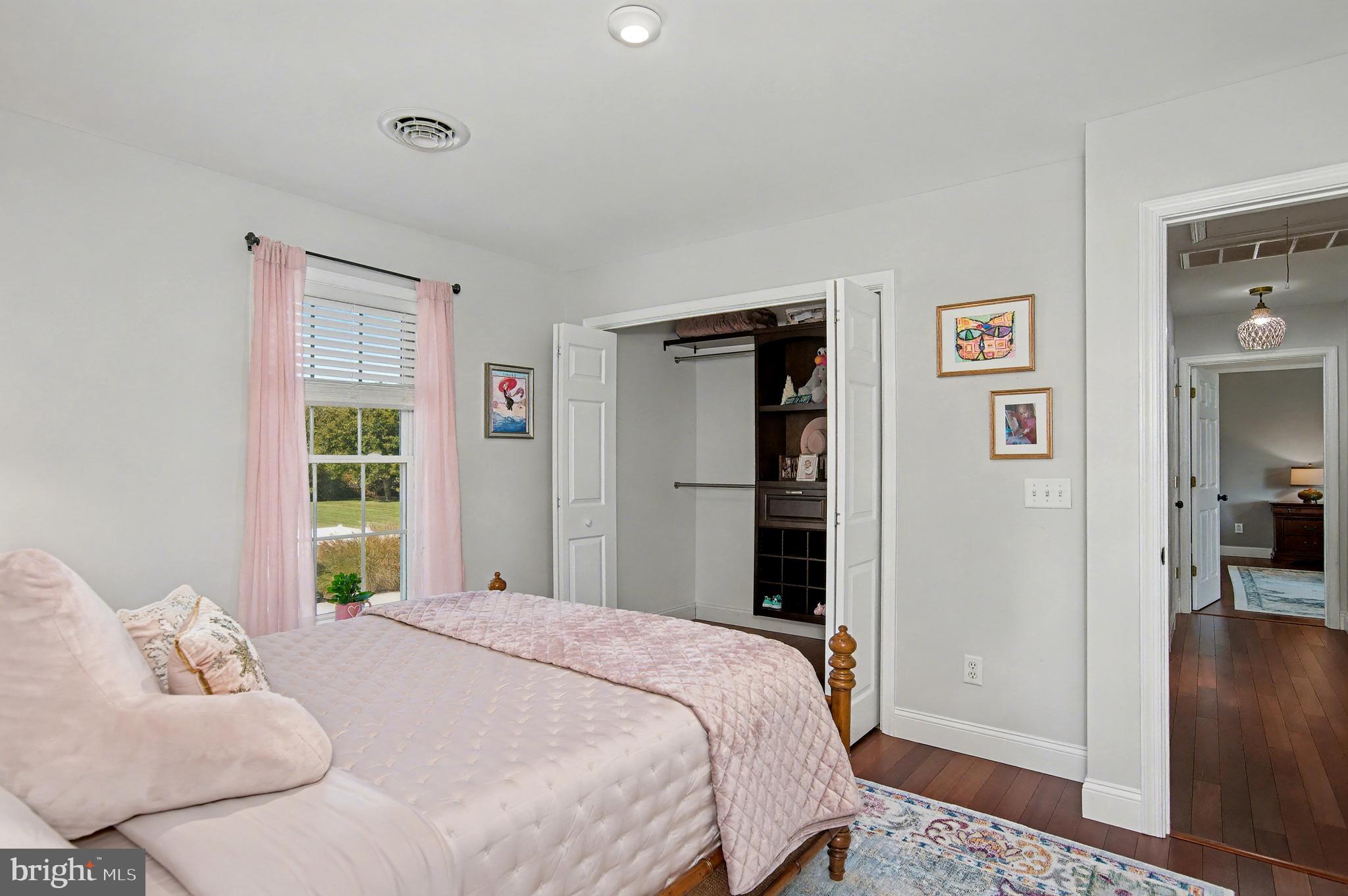 6660 Reeses Pride Road Sherwood, MD 21665 - Photo 52 of 72 a bedroom with a bed and a window