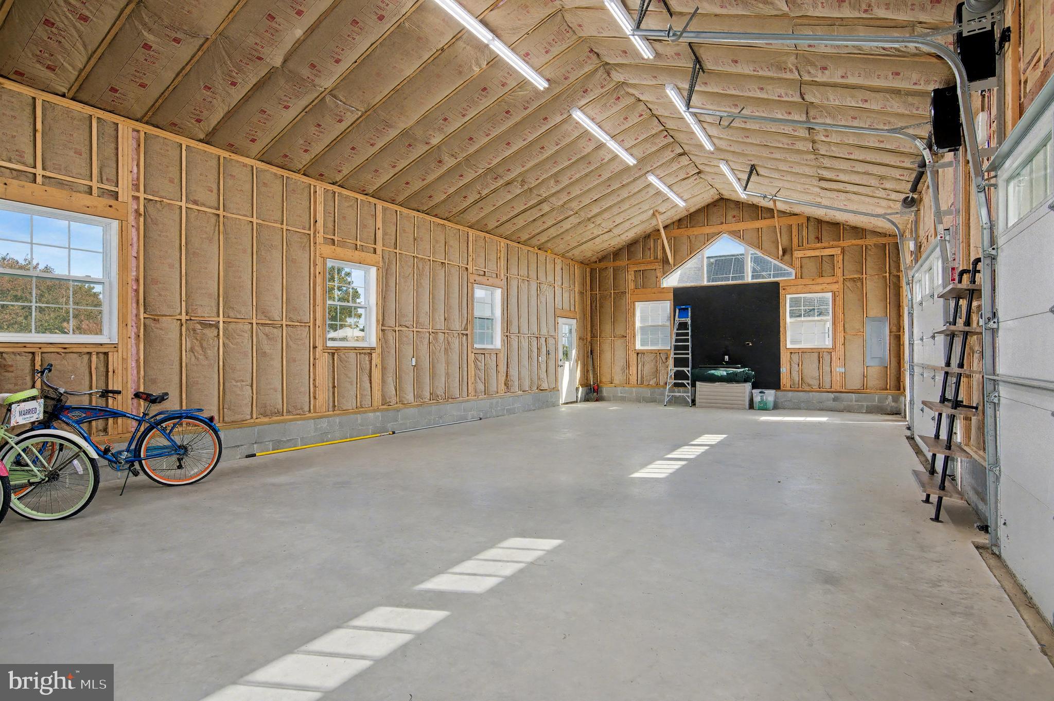 6660 Reeses Pride Road Sherwood, MD 21665 - Photo 60 of 72 a view of a livingroom with a chair and a cycle