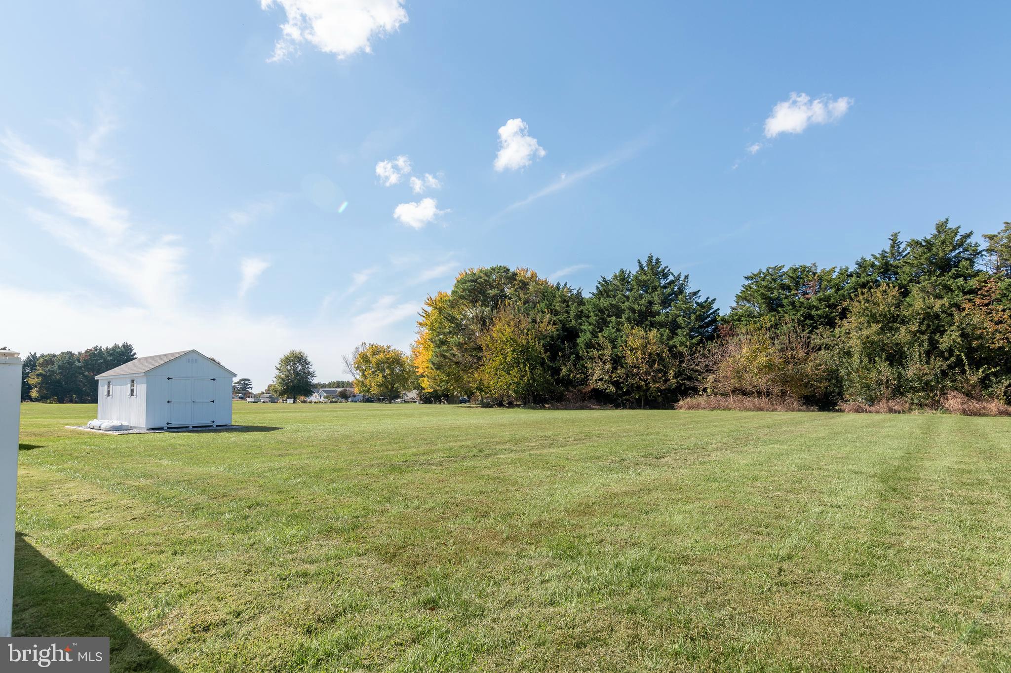 6660 Reeses Pride Road Sherwood, MD 21665 - Photo 64 of 72 a view of a big yard with a fountain