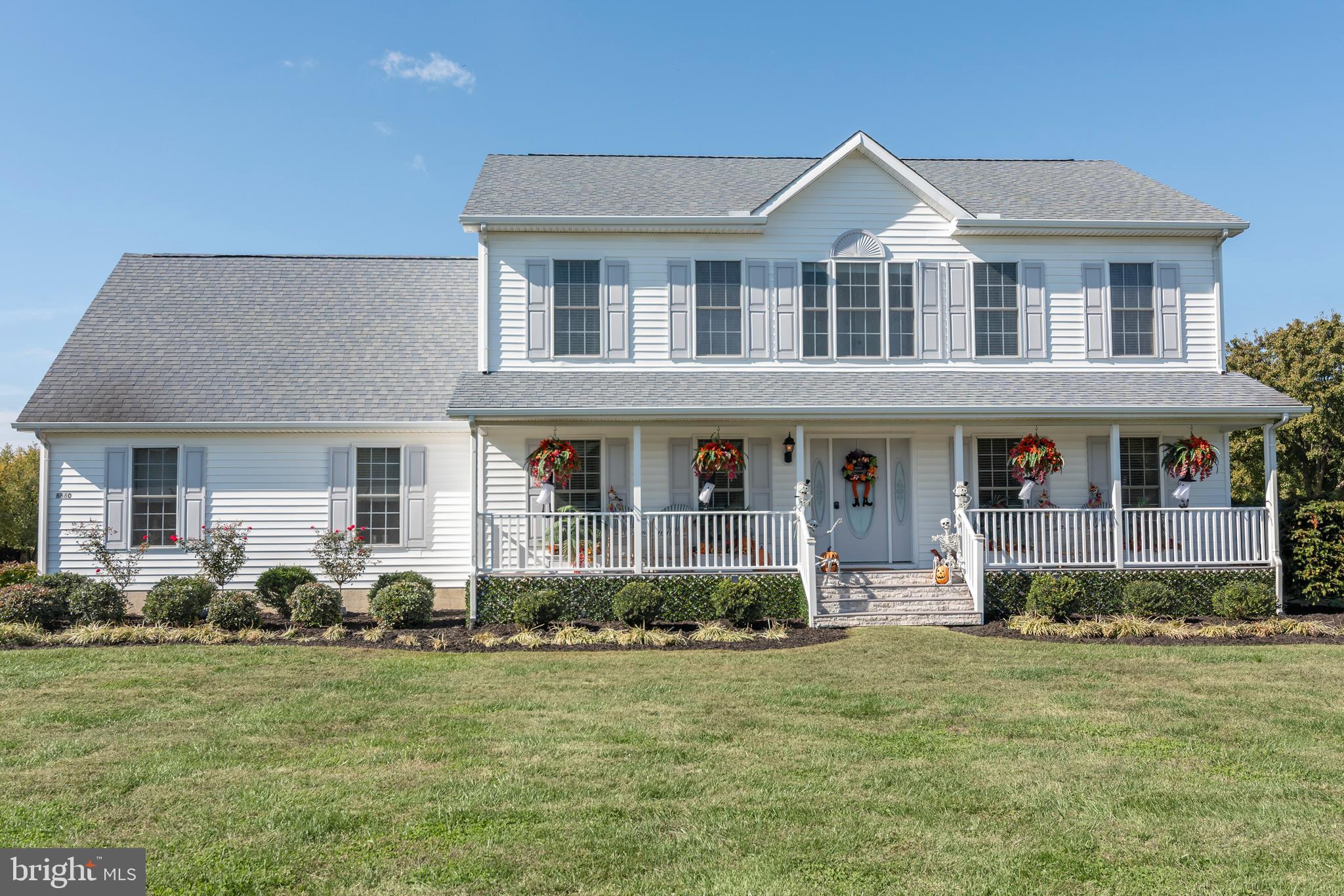 6660 Reeses Pride Road Sherwood, MD 21665 - Photo 10 of 72 a front view of a house with garden