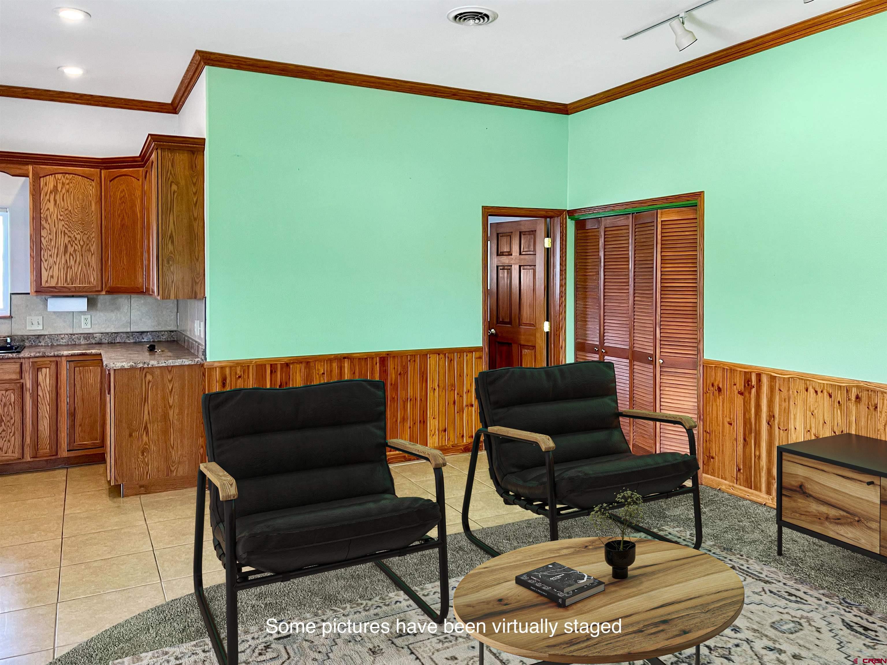 11604 5800th Road Montrose, CO 81403 - Photo 12 of 43 a living room with furniture and a window