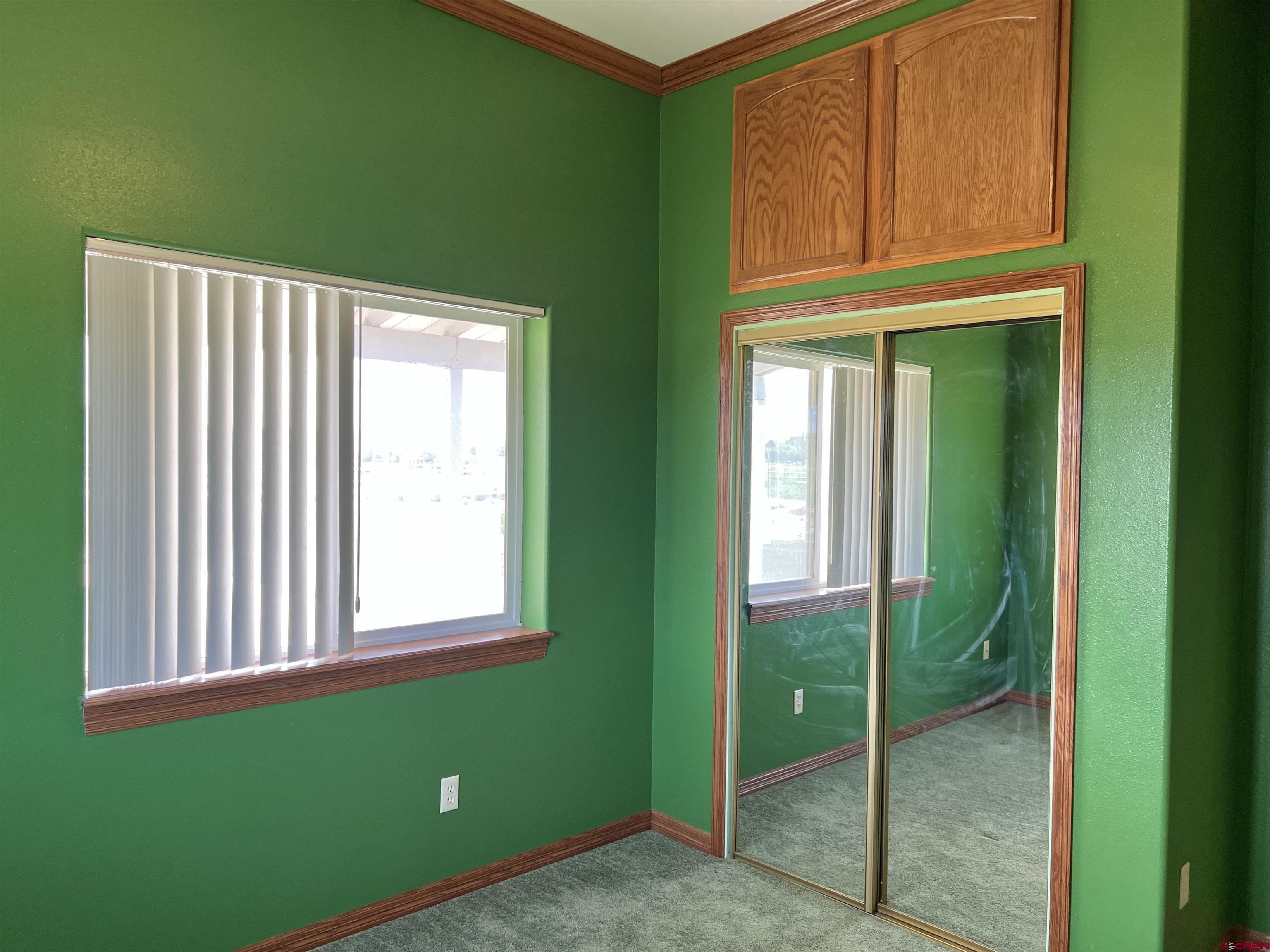 11604 5800th Road Montrose, CO 81403 - Photo 16 of 43 a view of an empty room with window