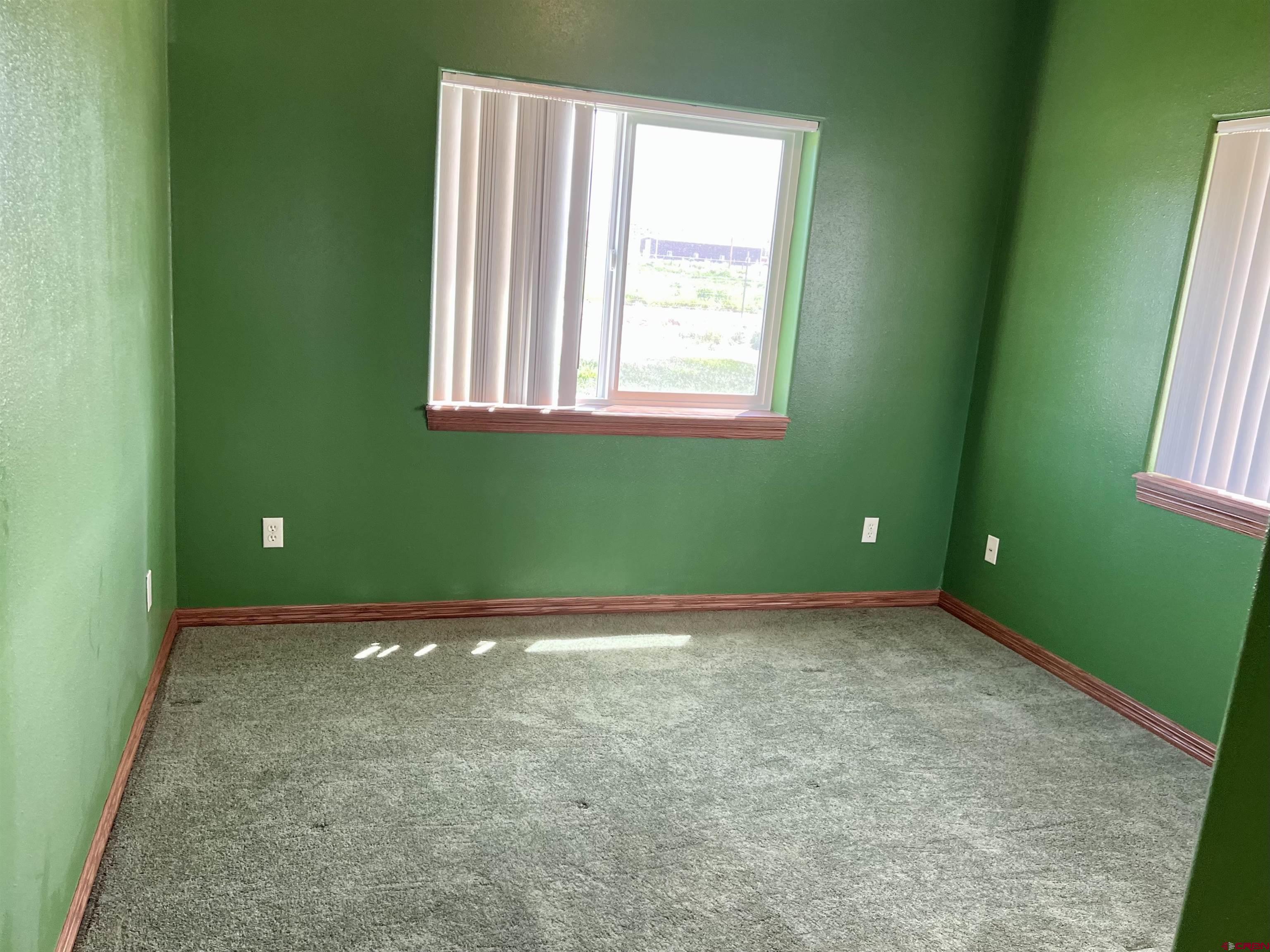 11604 5800th Road Montrose, CO 81403 - Photo 17 of 43 a view of an empty room with window