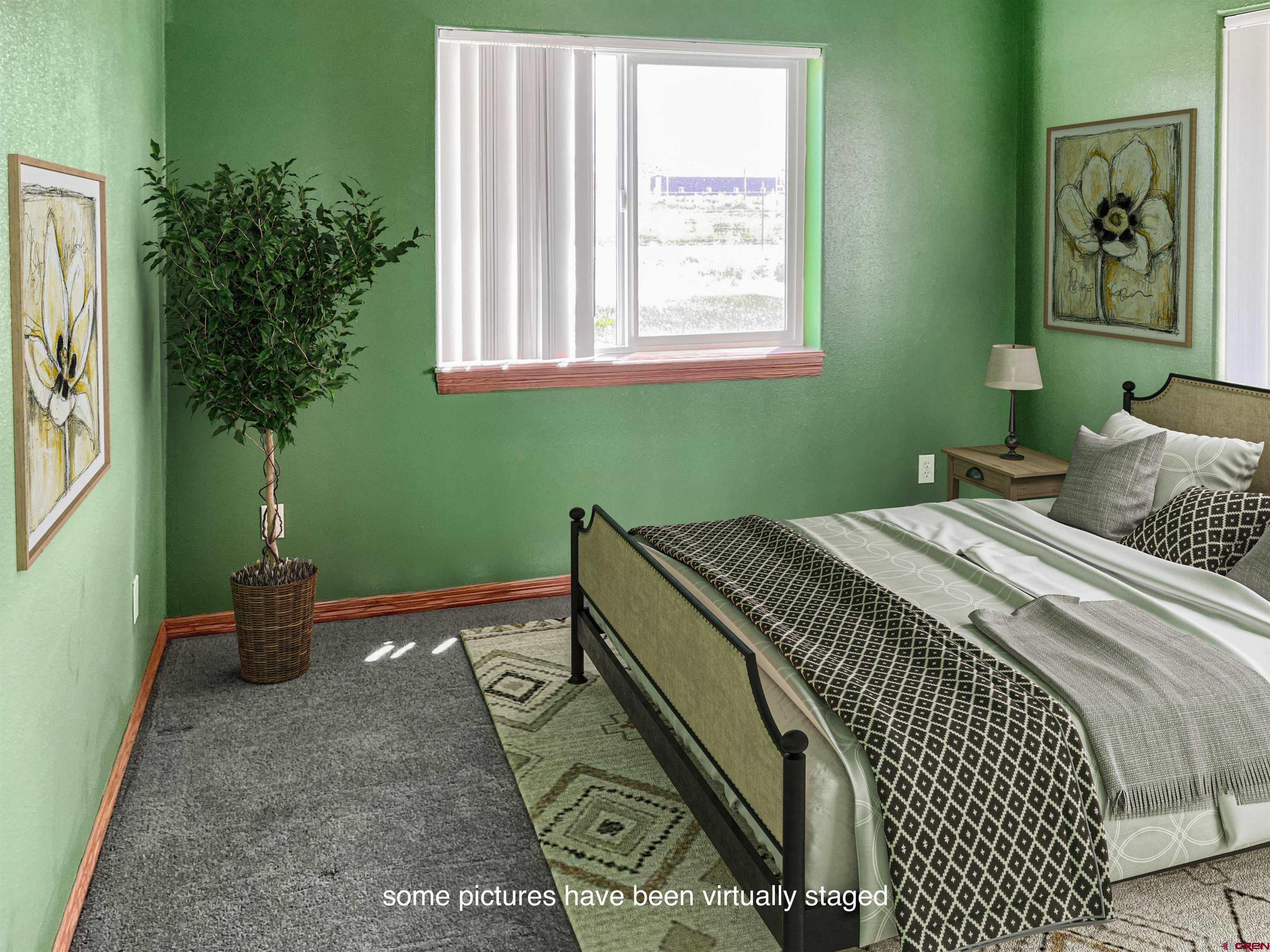 11604 5800th Road Montrose, CO 81403 - Photo 18 of 43 a bedroom with a bed and a window