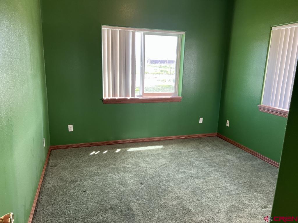 11604 5800th Road Montrose, CO 81403 - Photo 19 of 43 a view of a room with window and stairs