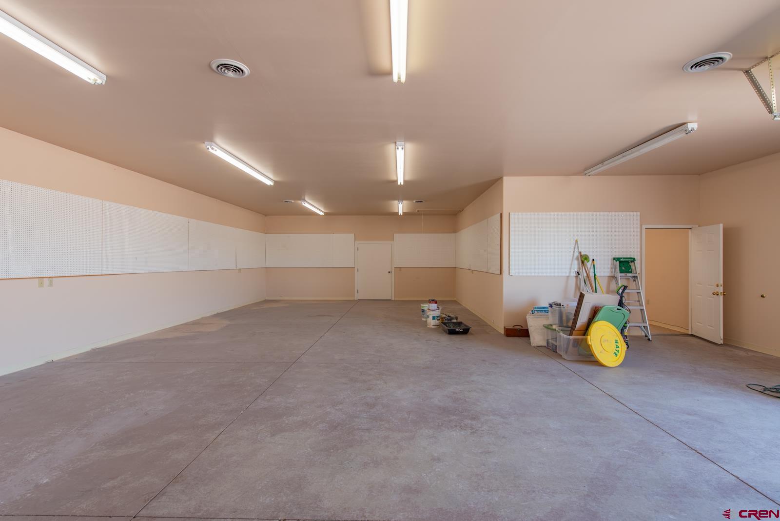 11604 5800th Road Montrose, CO 81403 - Photo 23 of 43 a view of a room with gym equipment