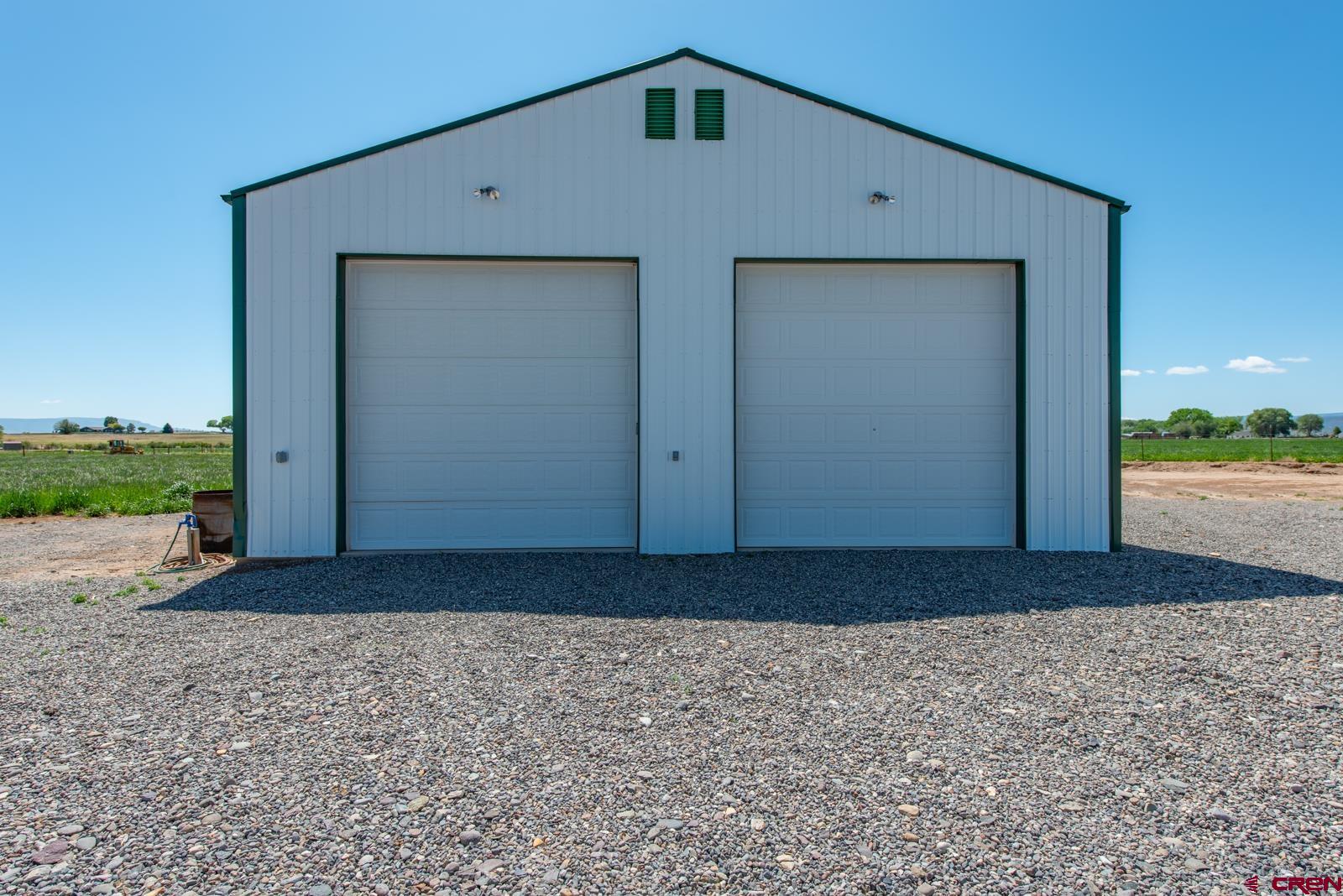 11604 5800th Road Montrose, CO 81403 - Photo 26 of 43 a front view of a house with a yard