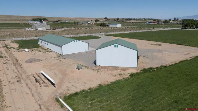 a view of a backyard with a lake view