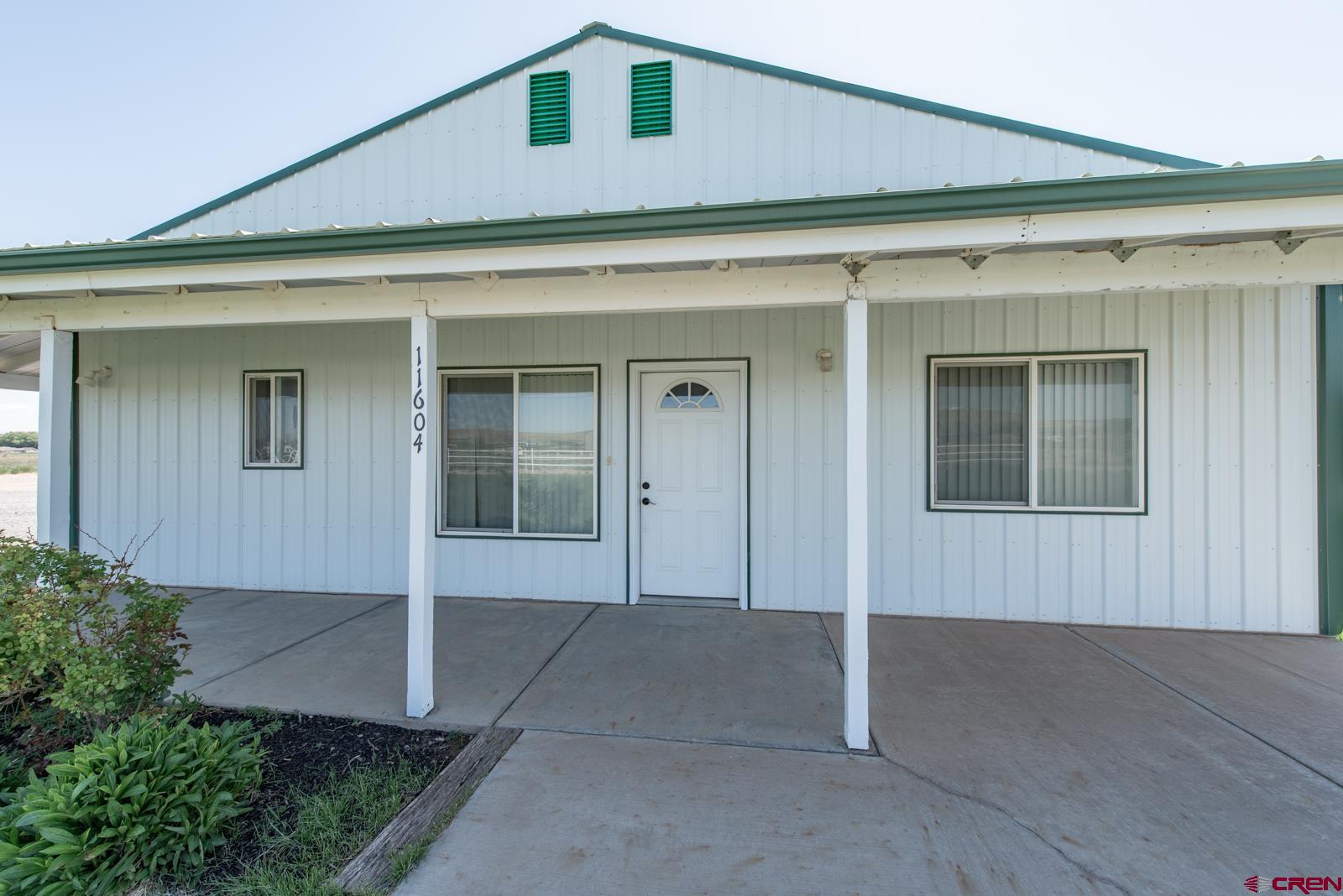 11604 5800th Road Montrose, CO 81403 - Photo 38 of 43 front view of a house
