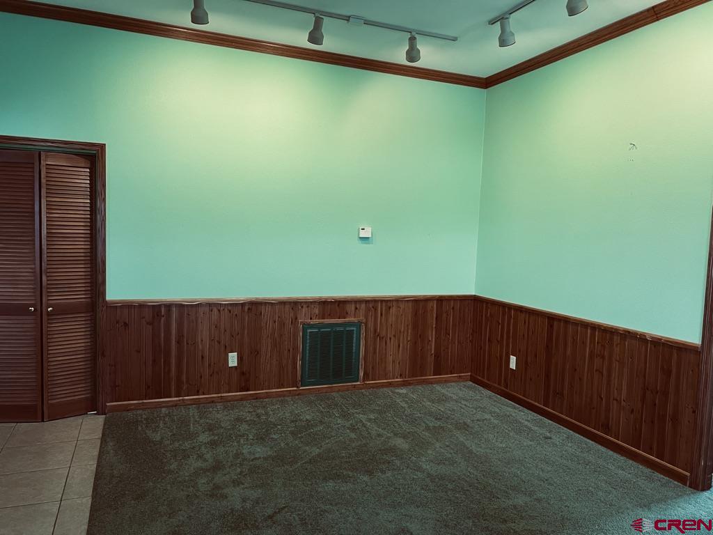 11604 5800th Road Montrose, CO 81403 - Photo 10 of 43 a room with a window and a ceiling fan