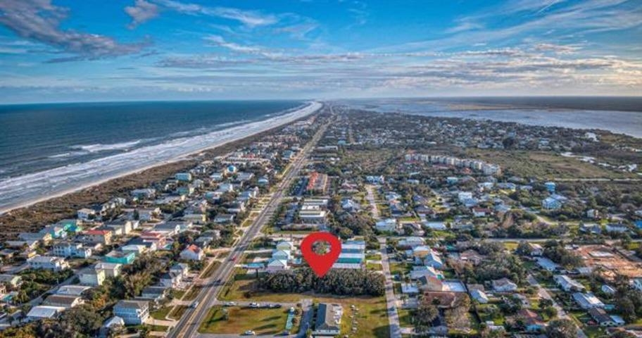 5478 1st Street St. Augustine, FL 32080 - Photo 2 of 2 Aerial overview of property's location featuring nearby suburban area and expansive beach