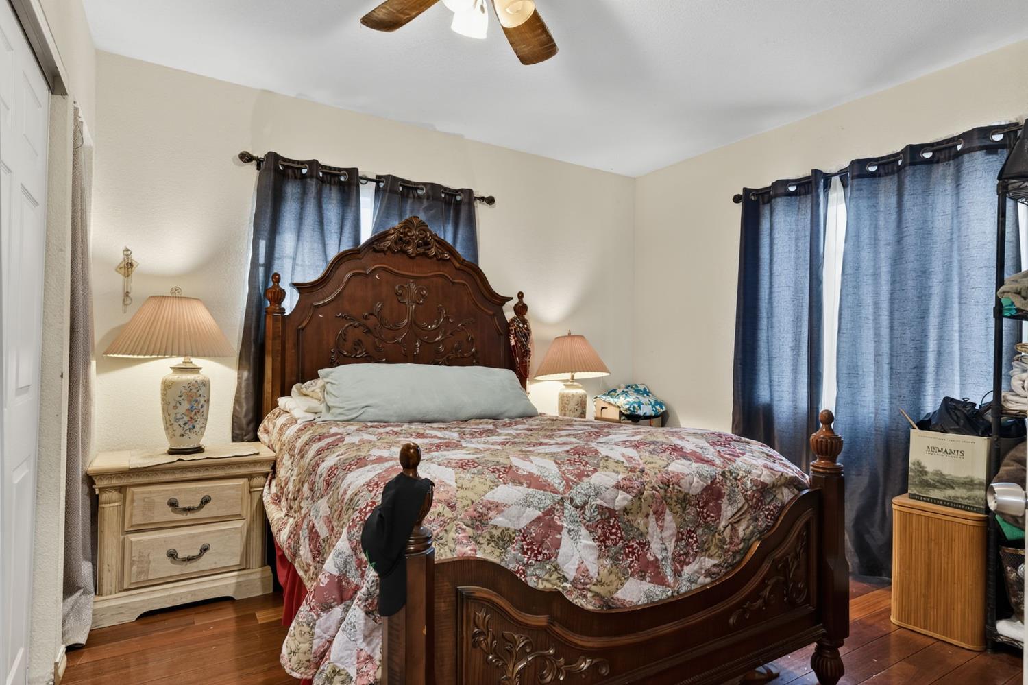 5263 Chile Camp Road Campo Seco X, CA 95226 - Photo 10 of 24 a bedroom with a bed and wooden floor