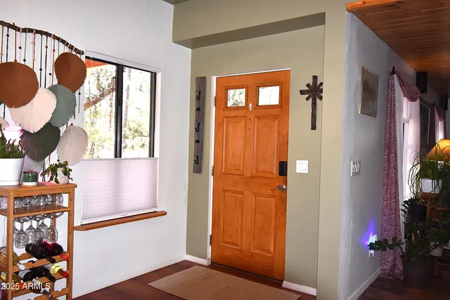 a kitchen with stainless steel appliances granite countertop a refrigerator and a stove