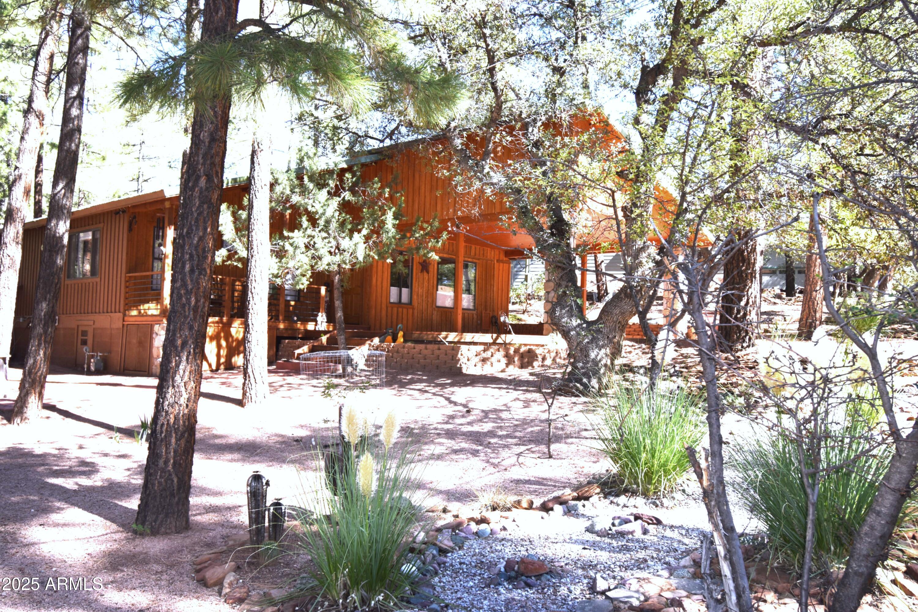 8742 Tonto Rim Drive Pine, AZ 85544 - Photo 2 of 41 a view of a park with tree s