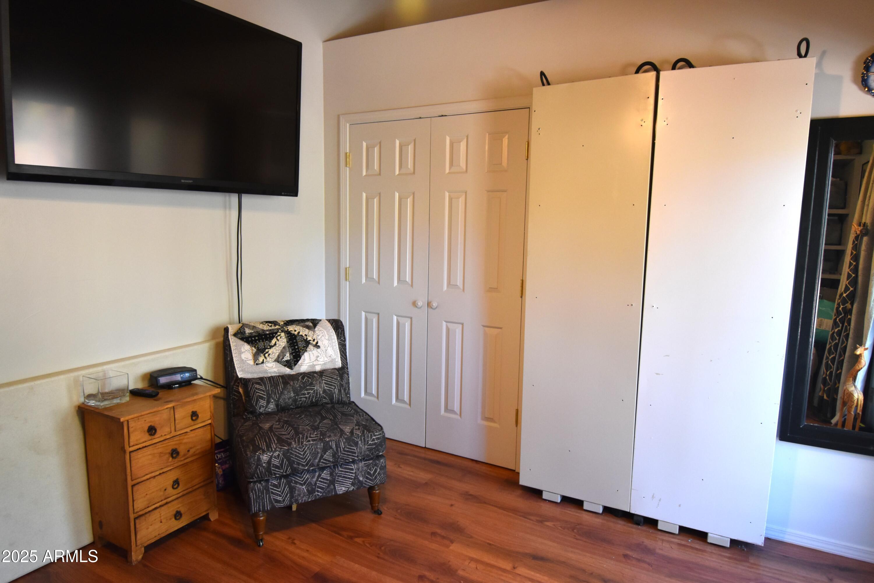 8742 Tonto Rim Drive Pine, AZ 85544 - Photo 33 of 41 a living room with furniture and a flat screen tv