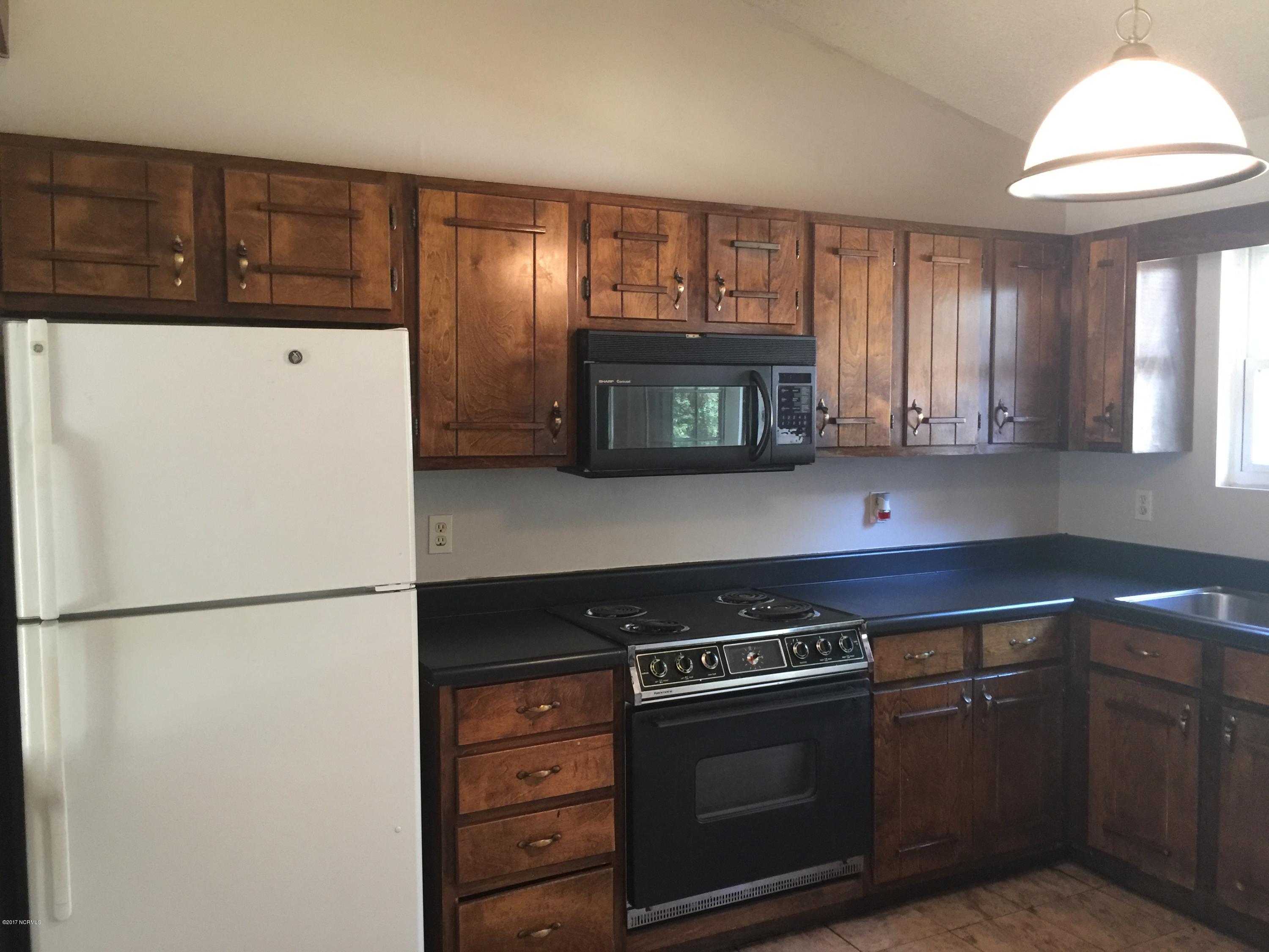 301 Hilda Road Jacksonville, NC 28546 - Photo 3 of 14 Refurbished countertops/cabinets!