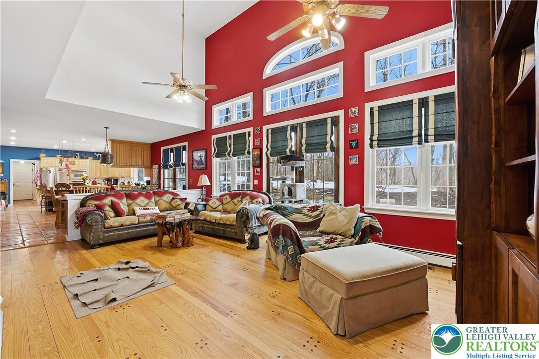 6688 Haasadahl Road Allentown, PA 18106 - Photo 11 of 33 a living room with furniture and a large window