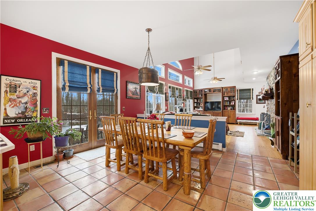 6688 Haasadahl Road Allentown, PA 18106 - Photo 12 of 33 a very nice looking room with a large window and kitchen view