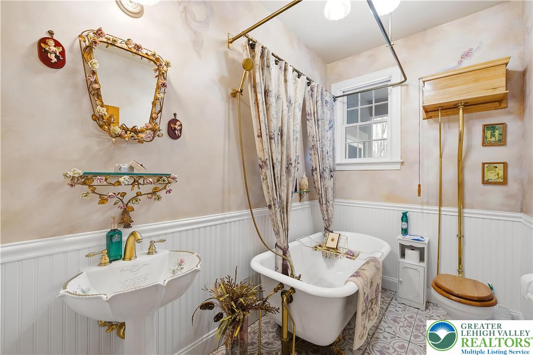 6688 Haasadahl Road Allentown, PA 18106 - Photo 17 of 34 a bathroom with a sink and a bathtub