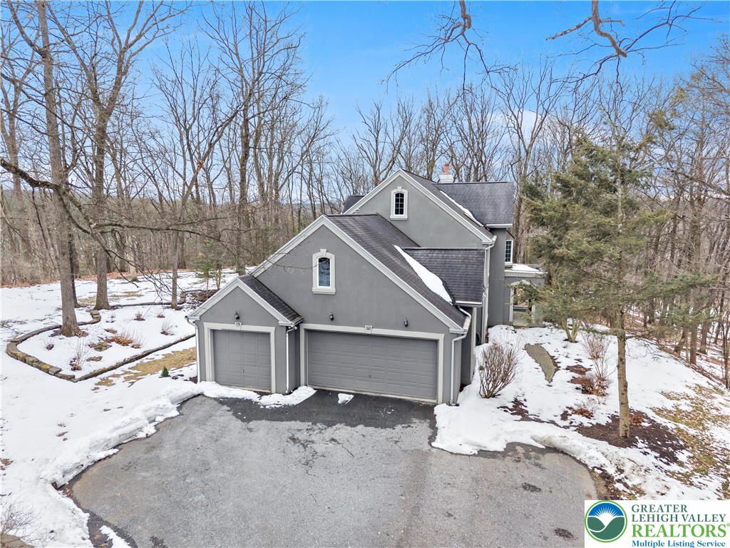 6688 Haasadahl Road Allentown, PA 18106 - Photo 2 of 33 a view of a house with a snow in the yard