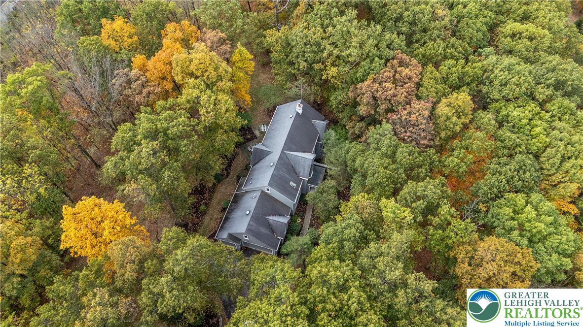 6688 Haasadahl Road Allentown, PA 18106 - Photo 3 of 33 a view of a house with a yard and large trees
