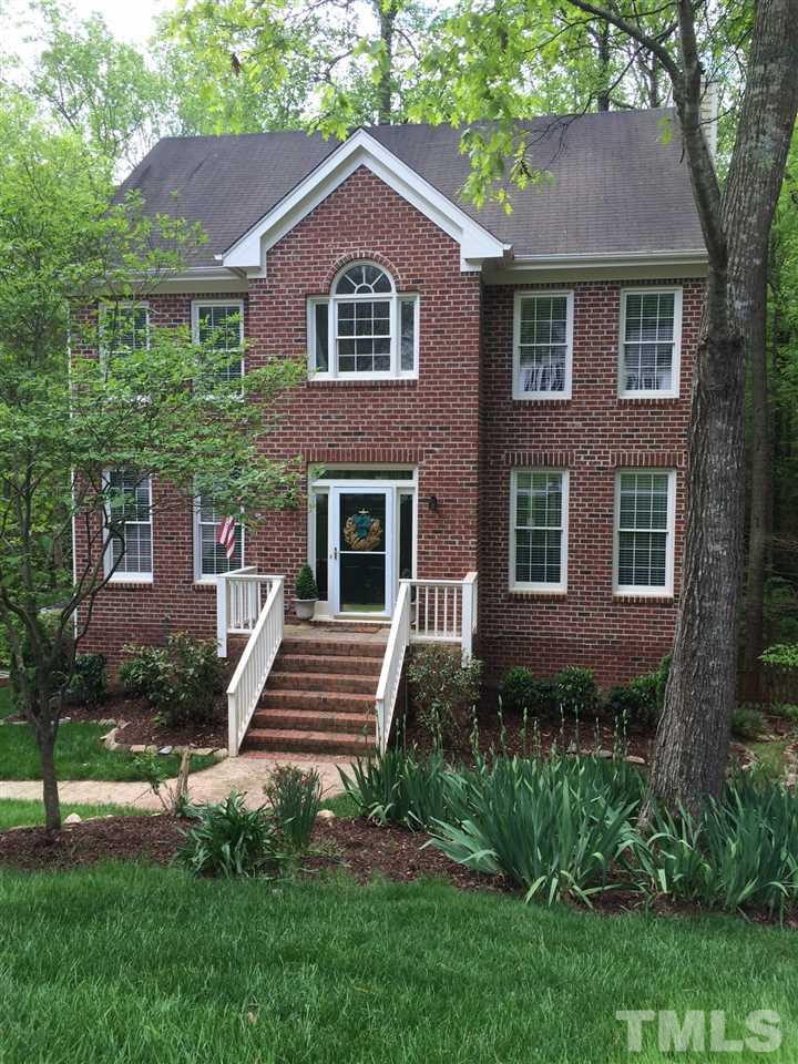 5944 Dunbarton Way Raleigh, NC 27613 - Photo 1 of 19 a front view of a house with a yard