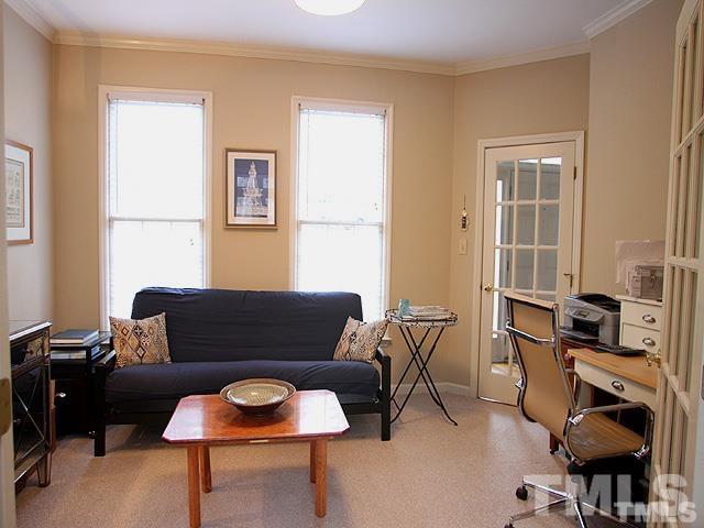 5944 Dunbarton Way Raleigh, NC 27613 - Photo 7 of 19 a living room with furniture and a window